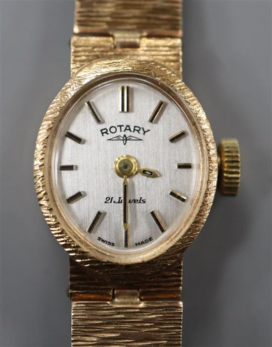 A ladys Rotary 9ct gold wristwatch on textured bracelet.